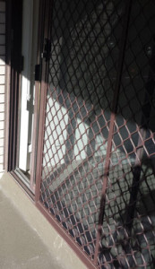 Sliding security door